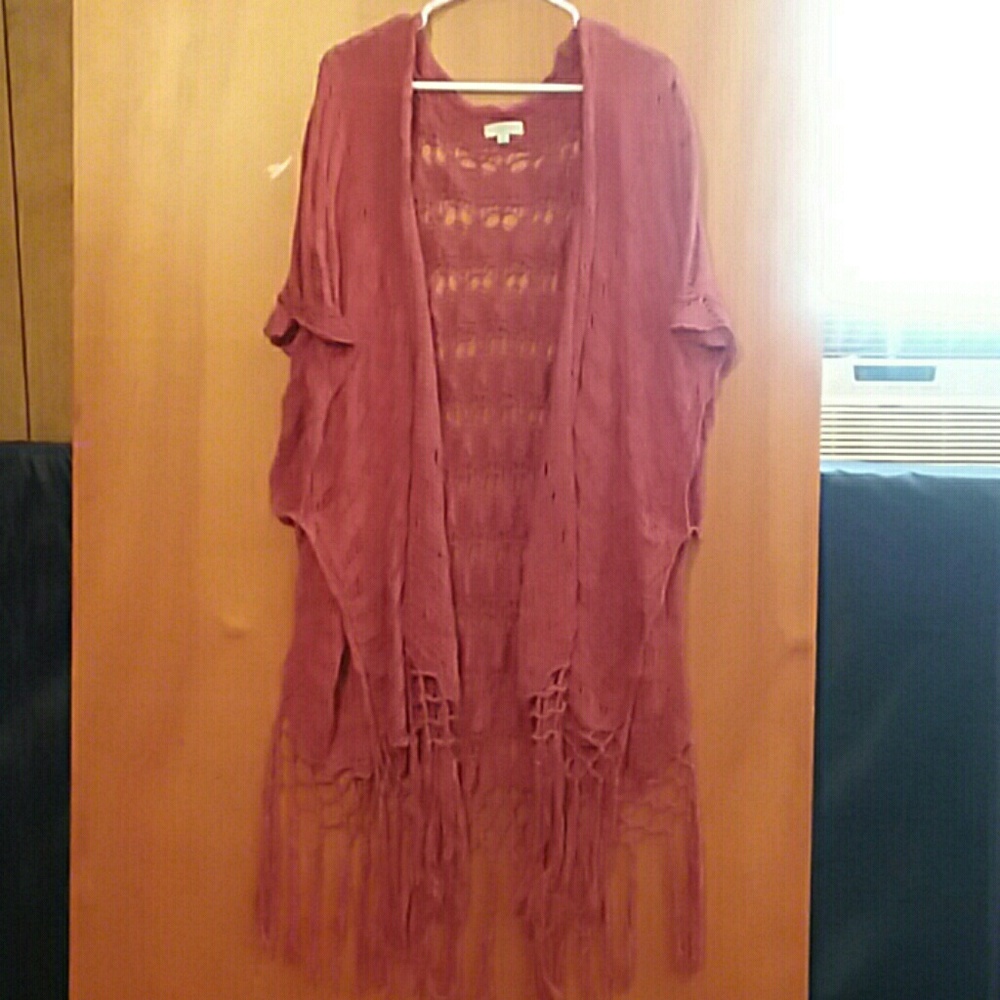 Rust colored crocheted vest by Kori.